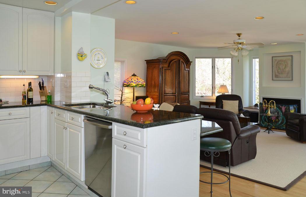 5603 Ridgefield Road Bethesda, MD 20816 - Photo 16 of 30 a kitchen with a sink cabinets and window