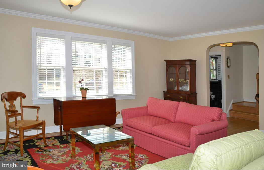 5603 Ridgefield Road Bethesda, MD 20816 - Photo 5 of 30 a living room with furniture and a window