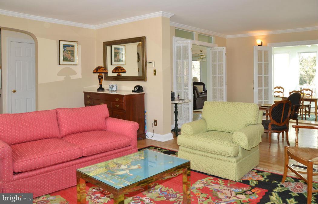 5603 Ridgefield Road Bethesda, MD 20816 - Photo 6 of 30 a living room with furniture and a couch