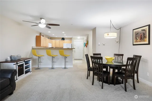 a view of a dining room with furniture