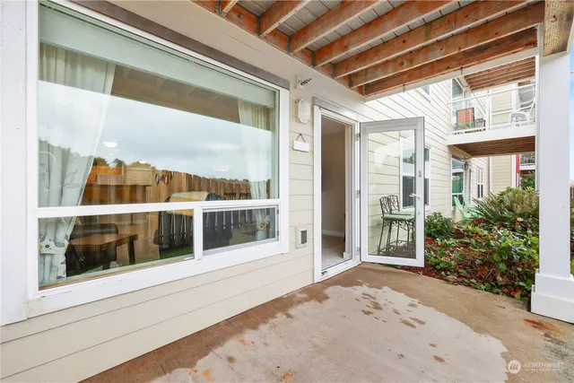 a view of a building with a glass door