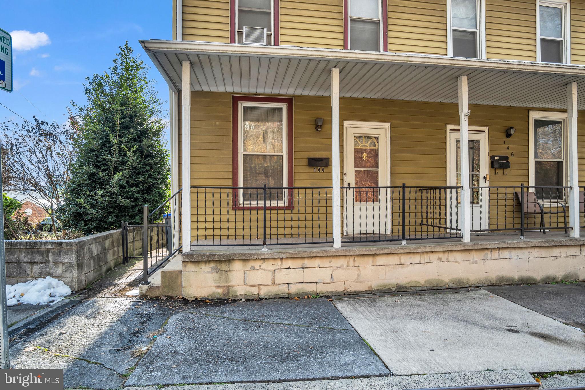 144 North 2nd Street Steelton, PA 17113 - Photo 23 of 29 a front view of a house with a yard