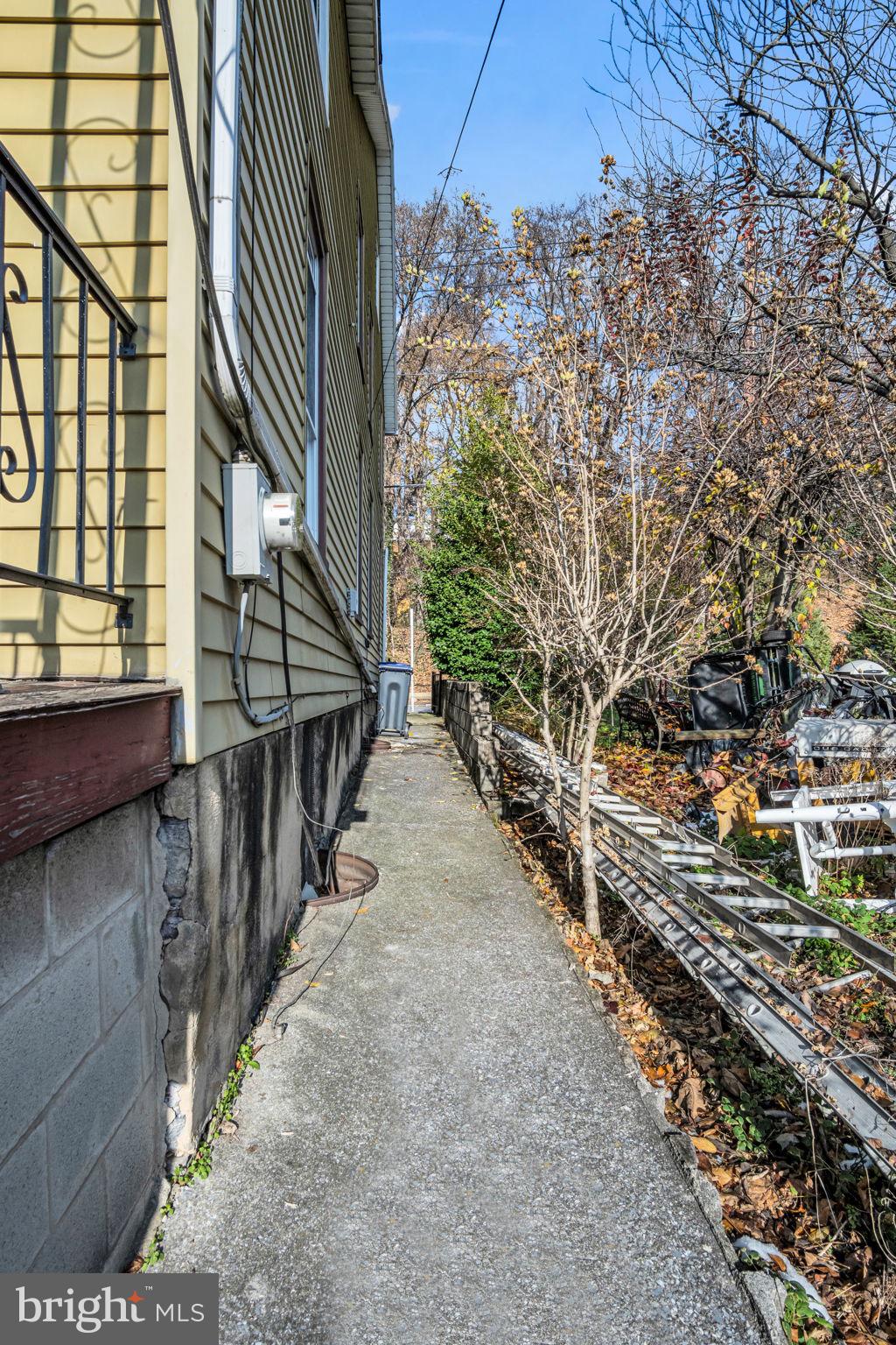 144 North 2nd Street Steelton, PA 17113 - Photo 4 of 29 a view of entryway with wooden stairs