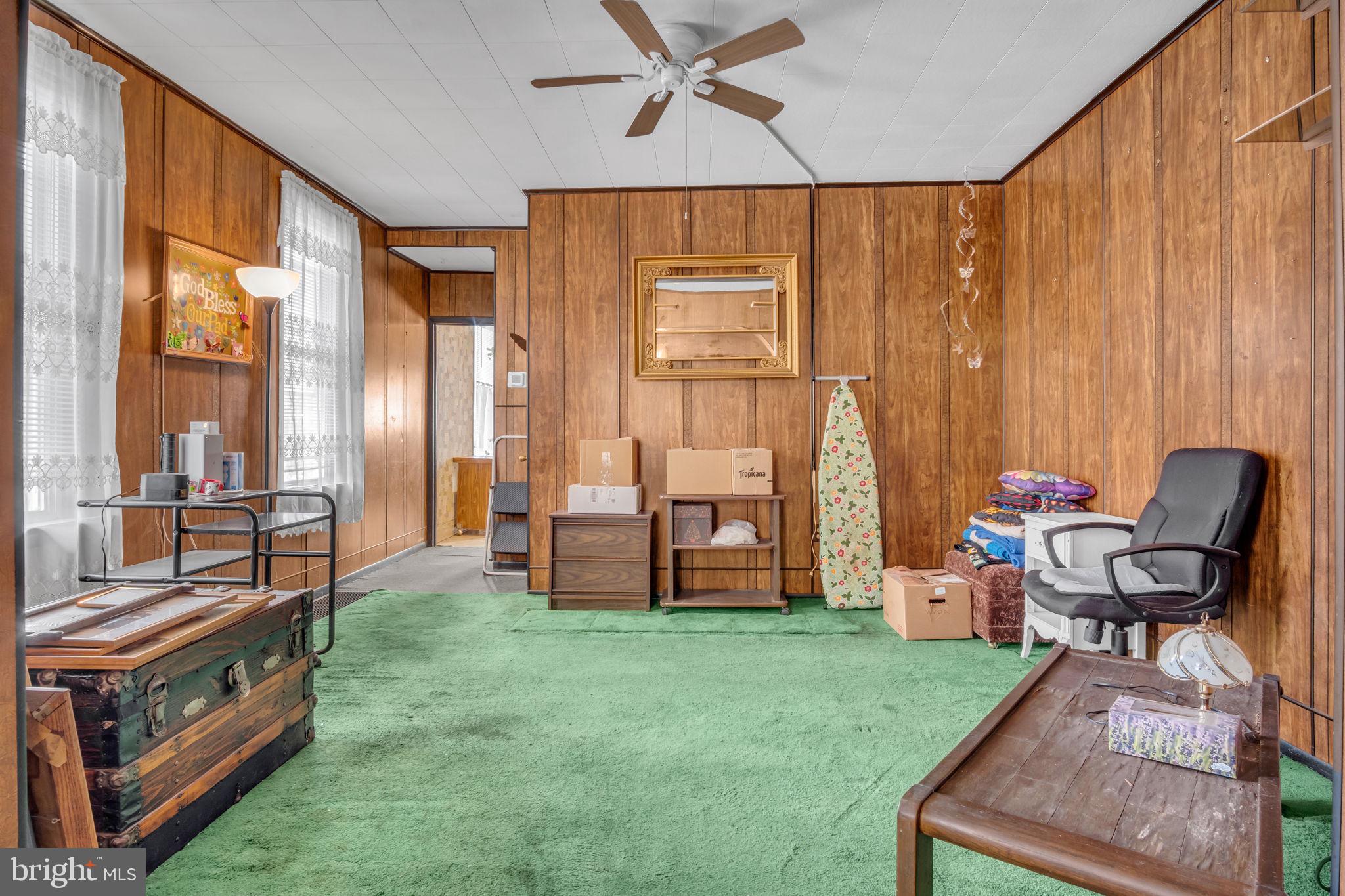 144 North 2nd Street Steelton, PA 17113 - Photo 8 of 29 a living room with furniture and a window