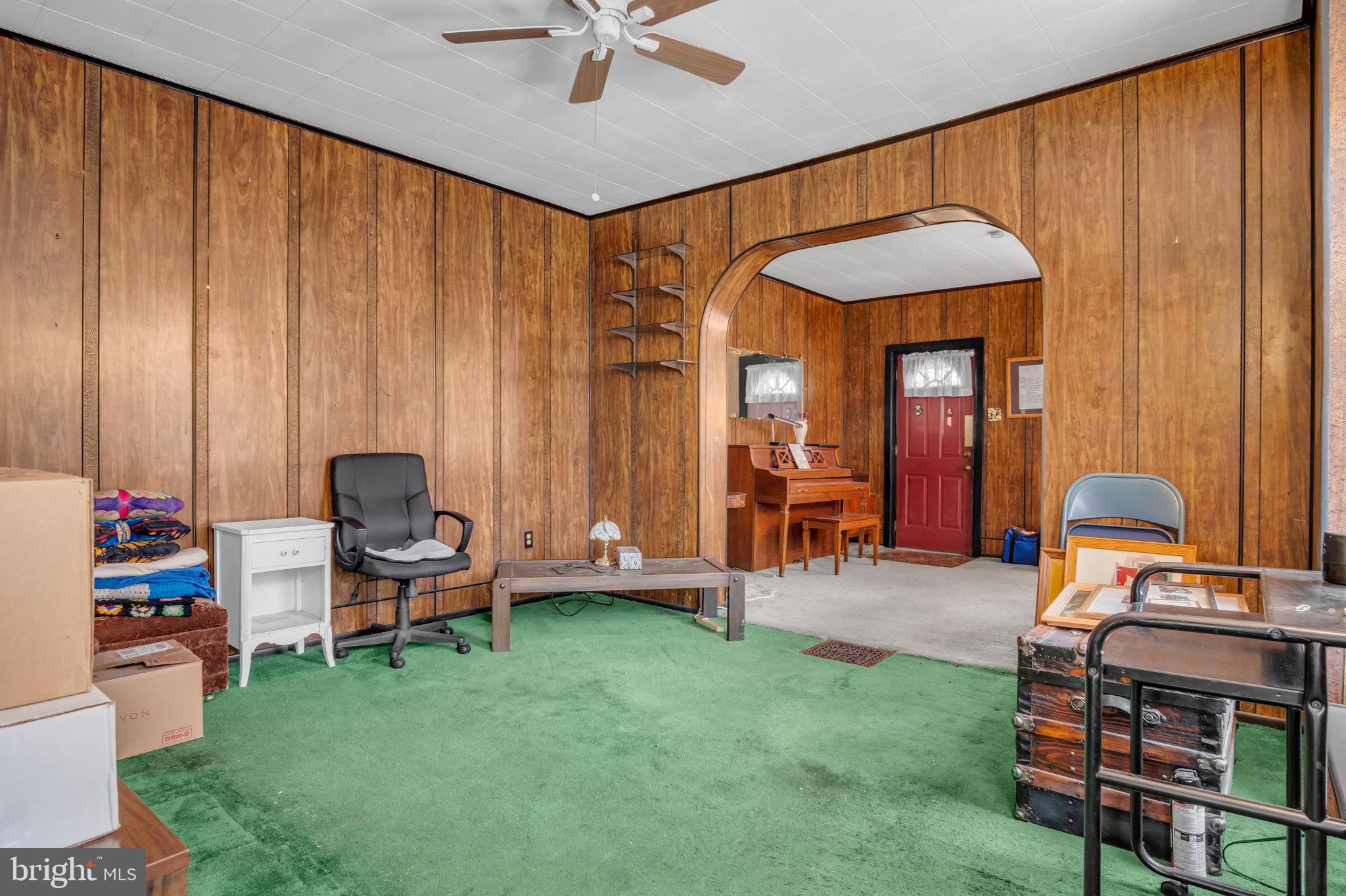 144 North 2nd Street Steelton, PA 17113 - Photo 9 of 29 a living room with furniture and a chandelier