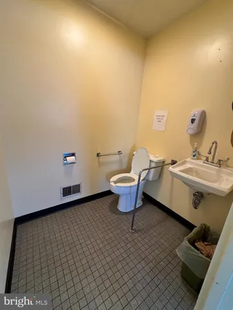 a bathroom with a sink and a toilet