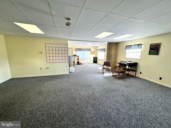 a view of a livingroom with furniture