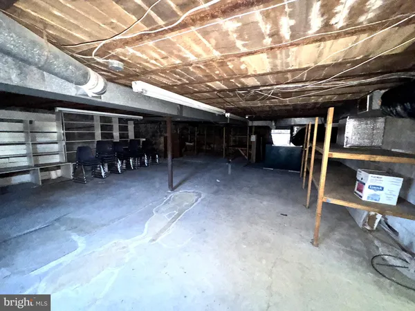 a view of a room with wooden racks