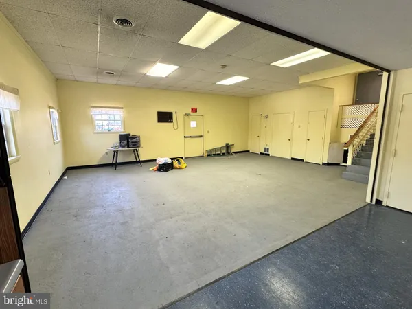 a view of a livingroom with a staircase