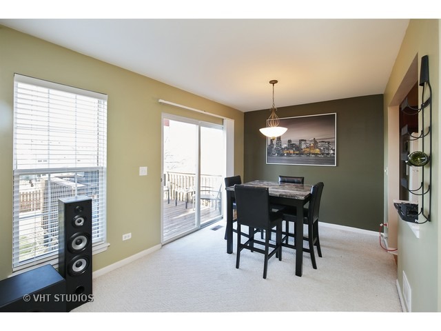 1069 Horizon Ridge Lake In The Hills, IL 60156 - Photo 5 of 10 a view of a dining room with furniture window and outside view