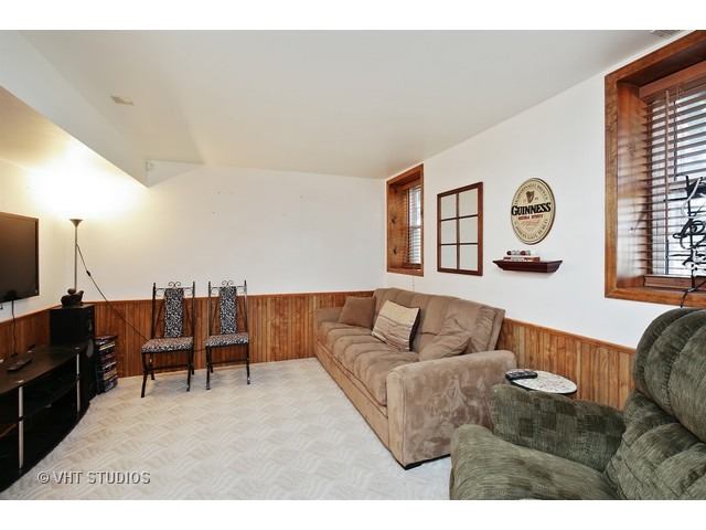 1069 Horizon Ridge Lake In The Hills, IL 60156 - Photo 6 of 10 a living room with furniture and a flat screen tv