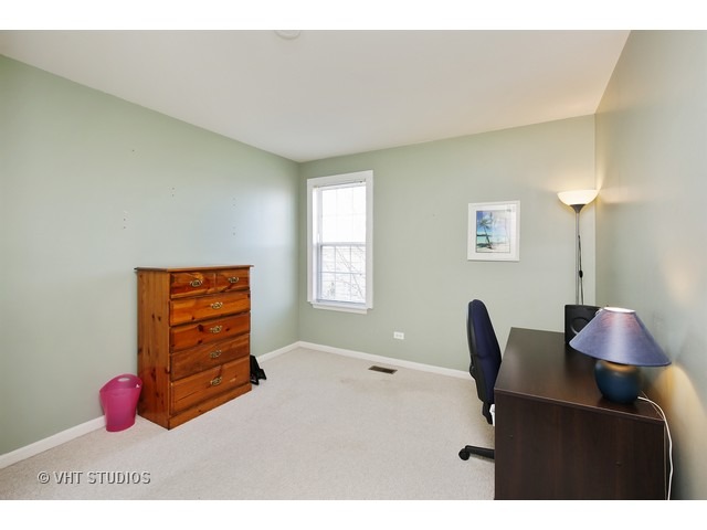 1069 Horizon Ridge Lake In The Hills, IL 60156 - Photo 8 of 10 a bedroom with a bed and a window
