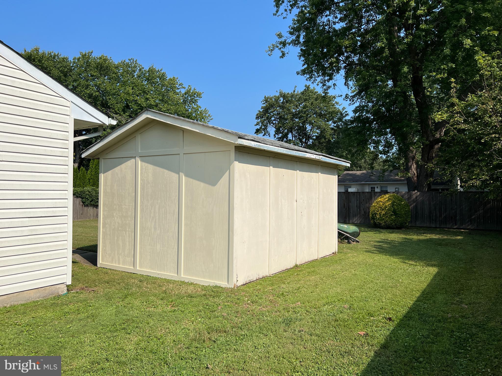 706 Kingfisher Road Deale, MD 20751 - Photo 27 of 30 a view of a small house with a yard