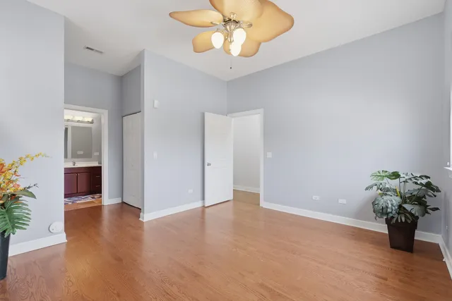 a view of an entryway with wooden floor