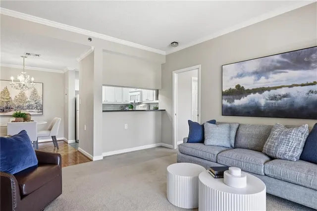 a kitchen with cabinets appliances a sink and a counter top