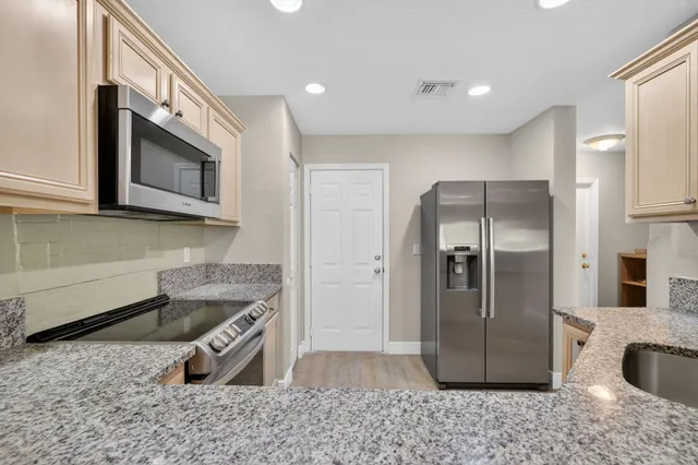 a workspace with furniture and a chair