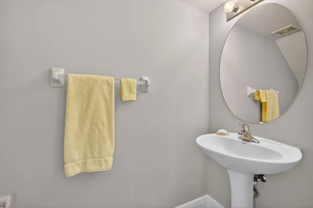 a view of a backyard of the house