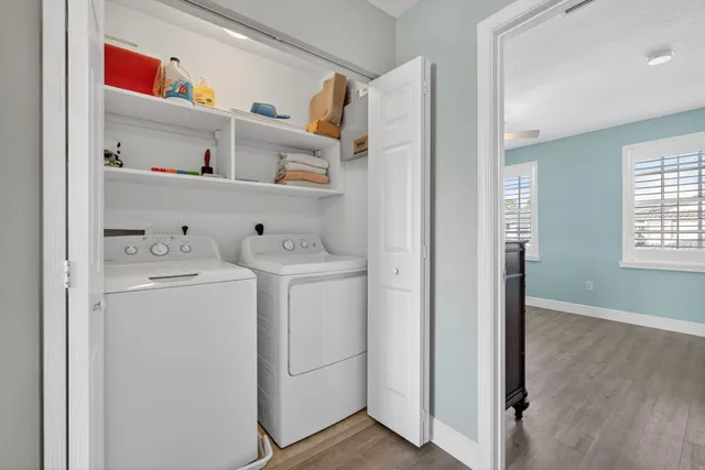 a dining room with furniture window and outside view