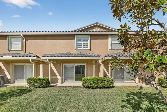 a view of street with sitting area