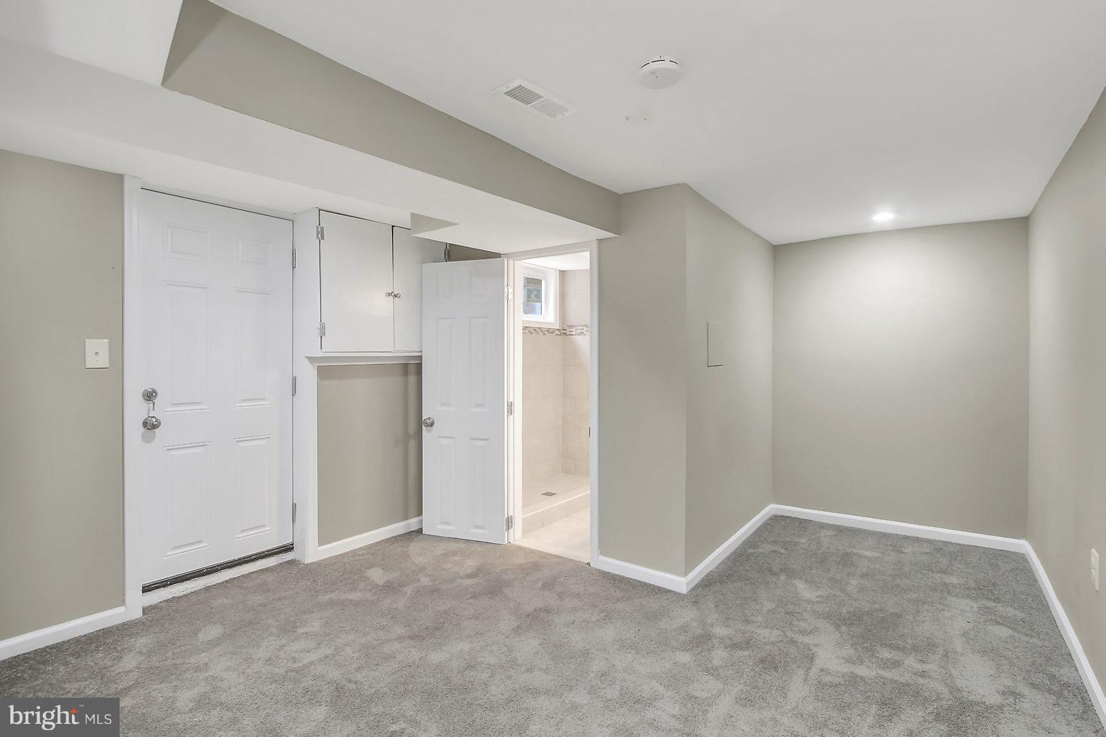 1321 Crofton Road Baltimore, MD 21239 - Photo 17 of 23 Basement Bedroom with Full Bath