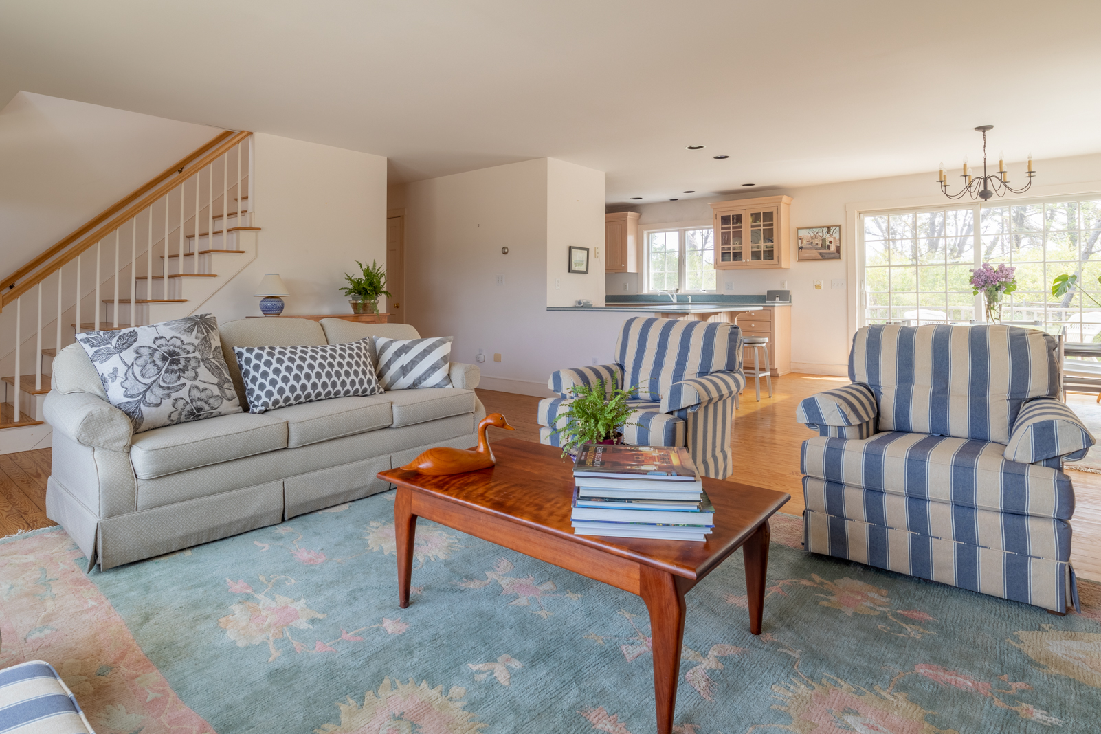 15 Swift Rock Road Nantucket, MA 02554 - Photo 8 of 32 a living room with furniture and a potted plant