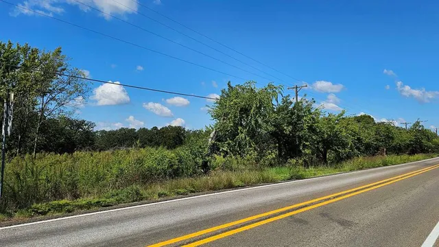 a view of a city street from a balcony