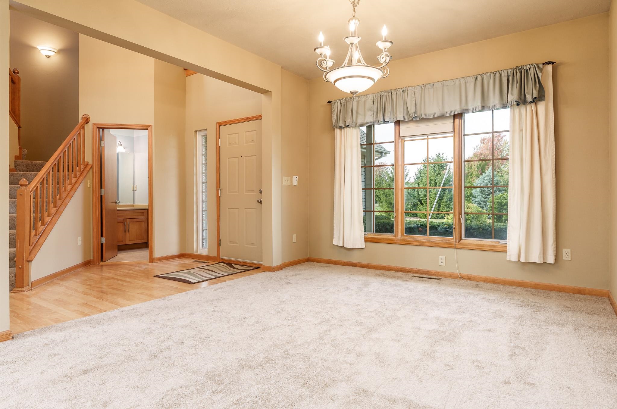 12859 Prairie Meadow Way Belvidere, IL 61008 - Photo 12 of 67 a view of an empty room with a window