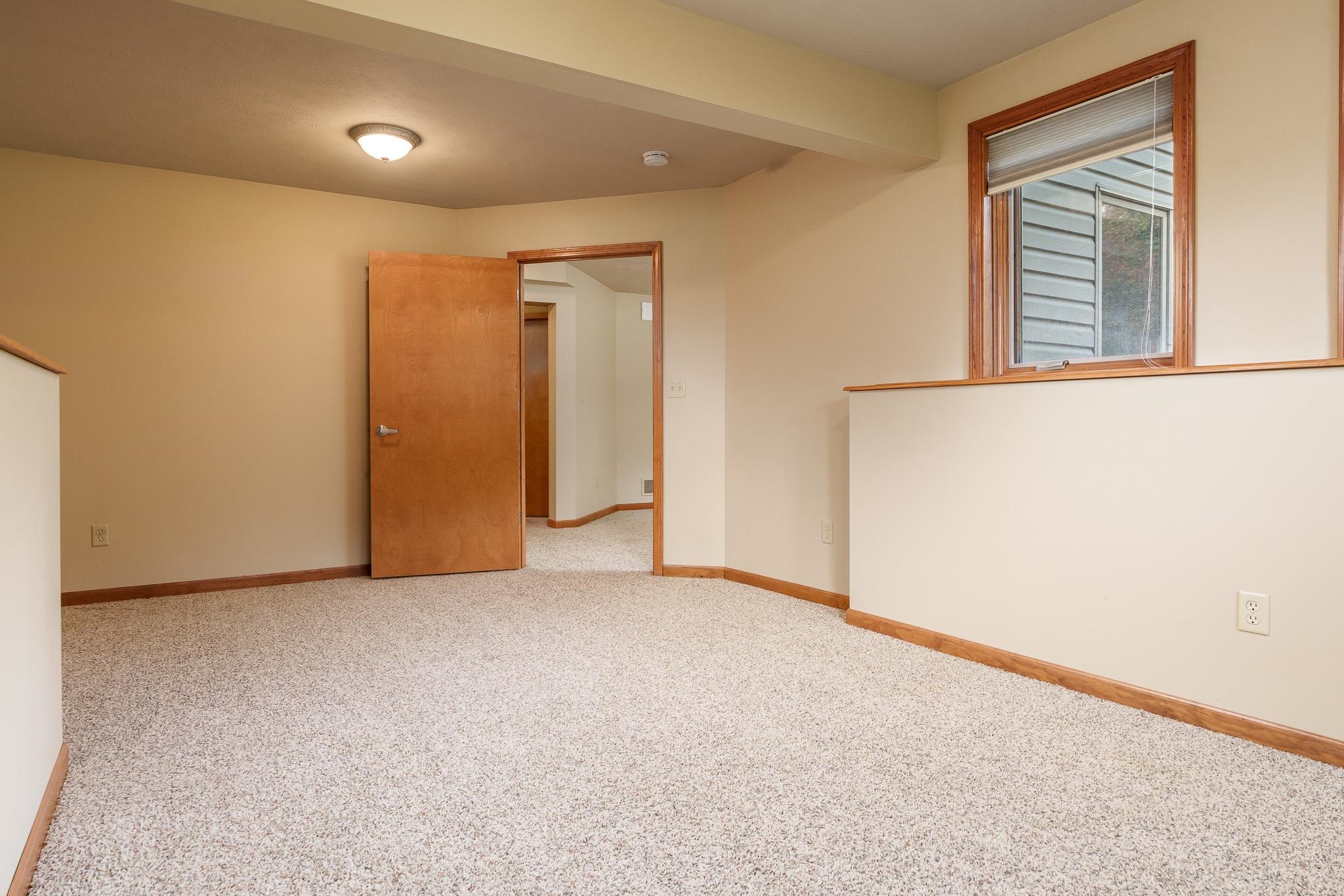 12859 Prairie Meadow Way Belvidere, IL 61008 - Photo 24 of 67 an empty room with windows