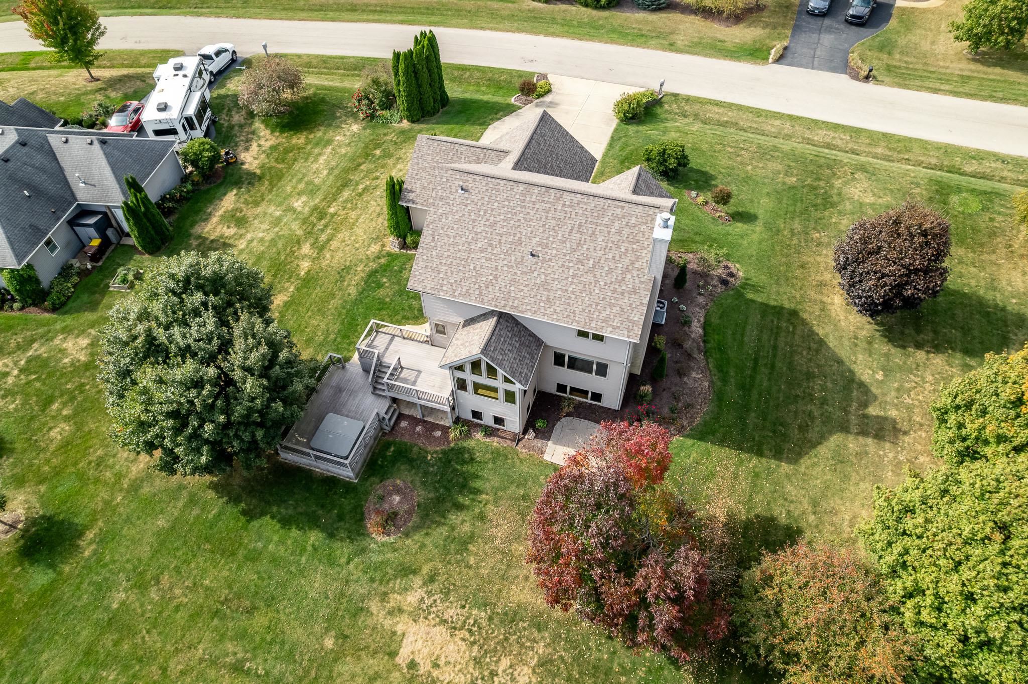 12859 Prairie Meadow Way Belvidere, IL 61008 - Photo 39 of 67 an aerial view of a house with garden space and street view