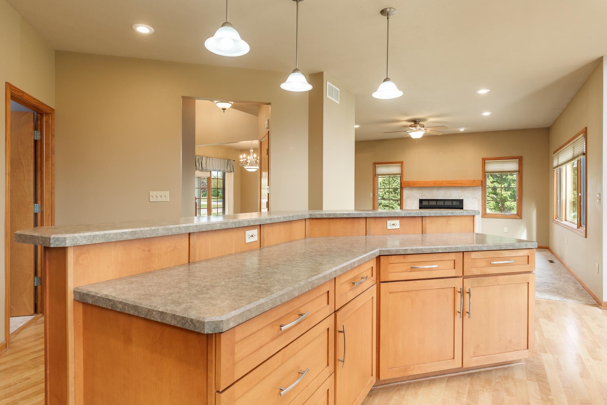 12859 Prairie Meadow Way Belvidere, IL 61008 - Photo 64 of 67 a kitchen with kitchen island a counter top space appliances and a view of living room