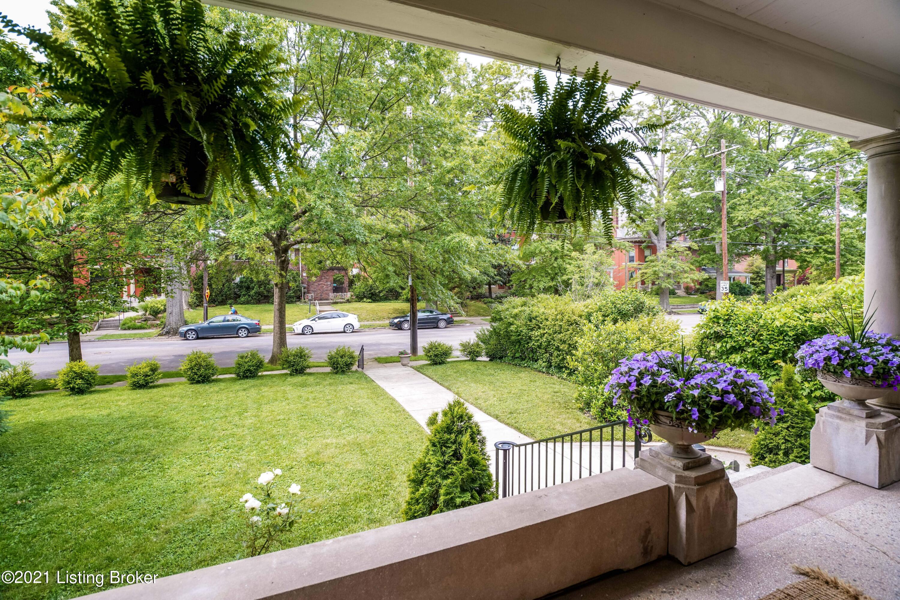 Expansive front porch overlooks Cherokee Road.