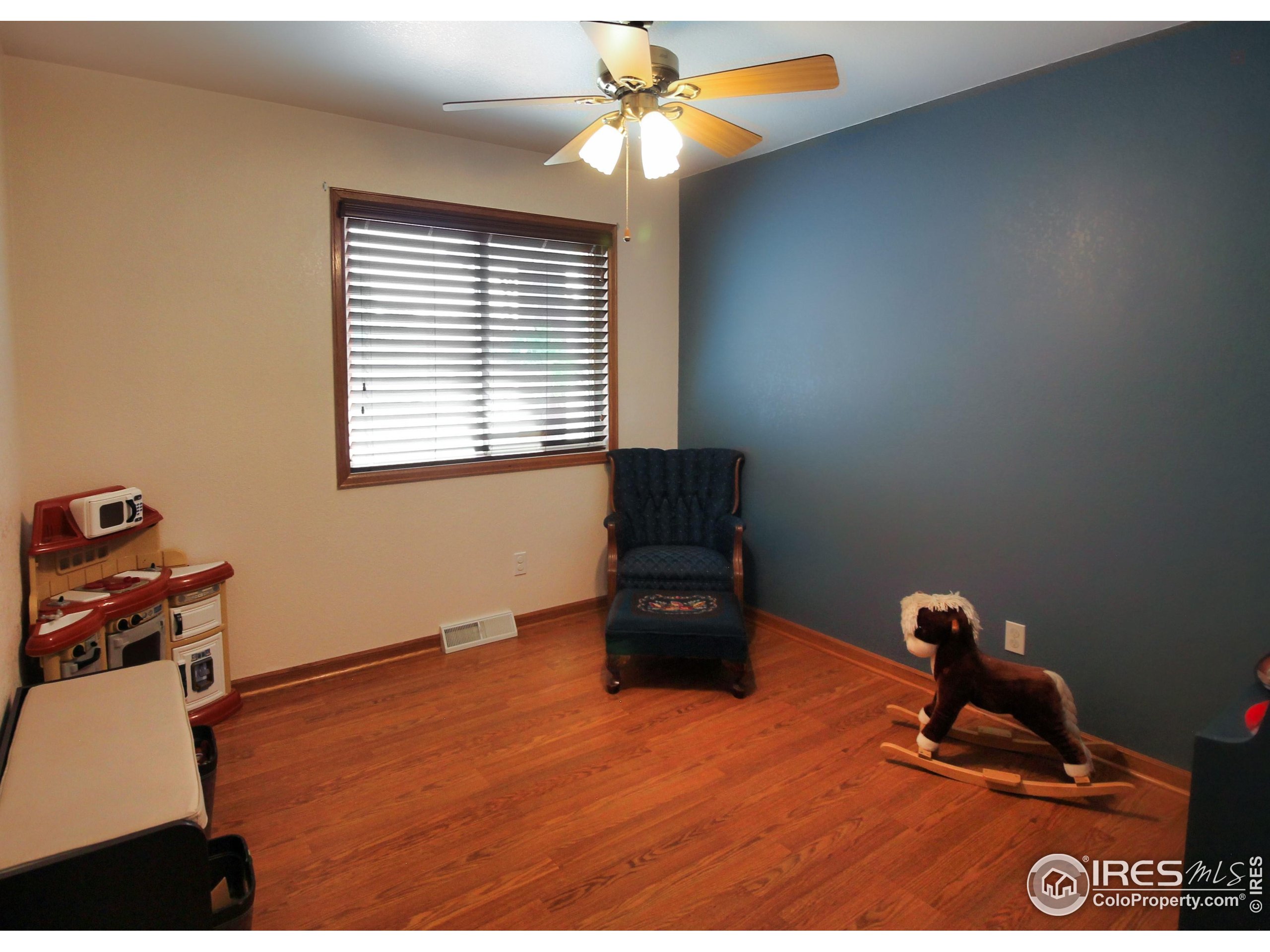 14363 Dakota Road Sterling, CO 80751 - Photo 18 of 40 a living room with furniture and a window