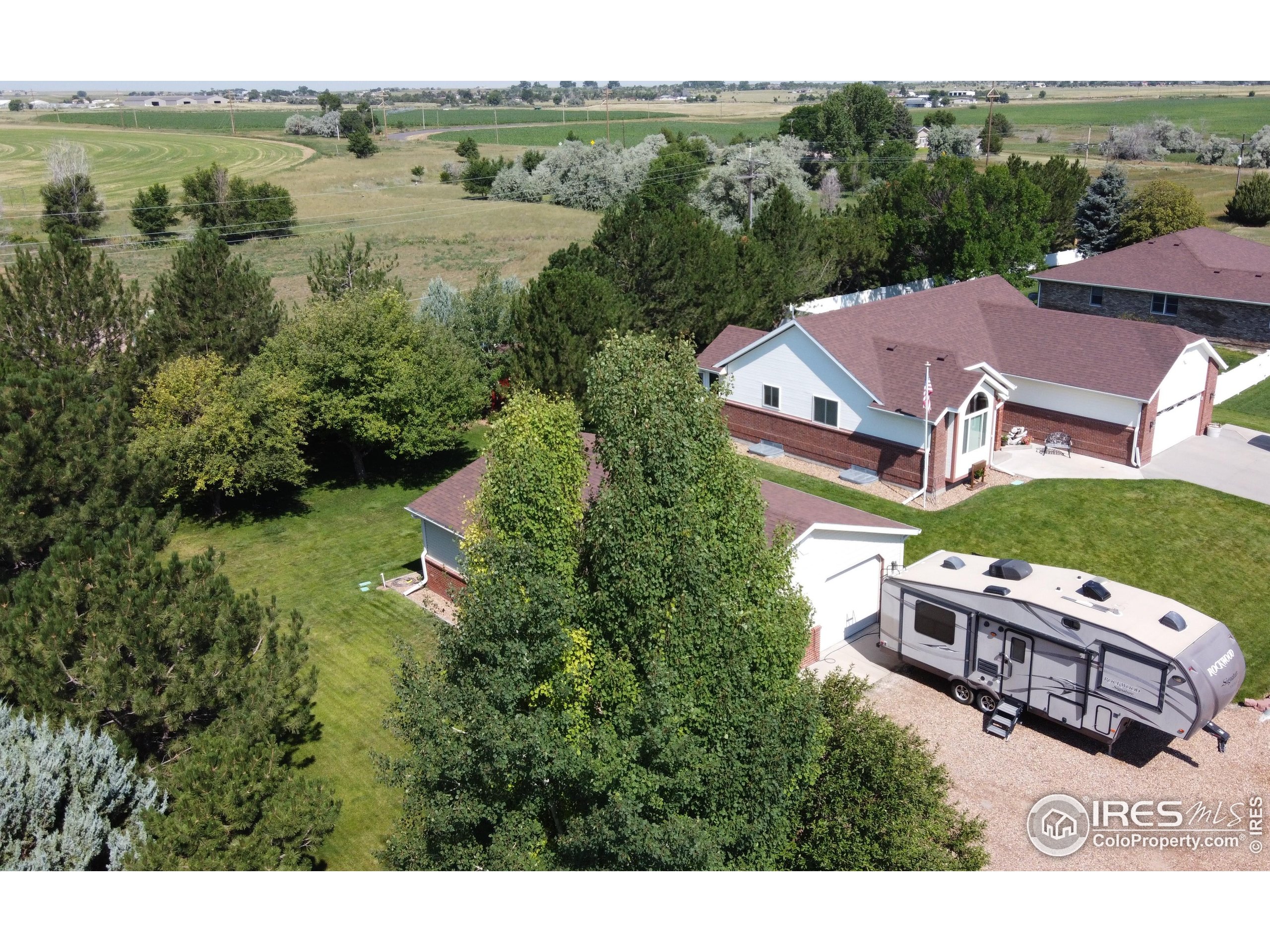 14363 Dakota Road Sterling, CO 80751 - Photo 2 of 40 an aerial view of residential house with outdoor space and lake view