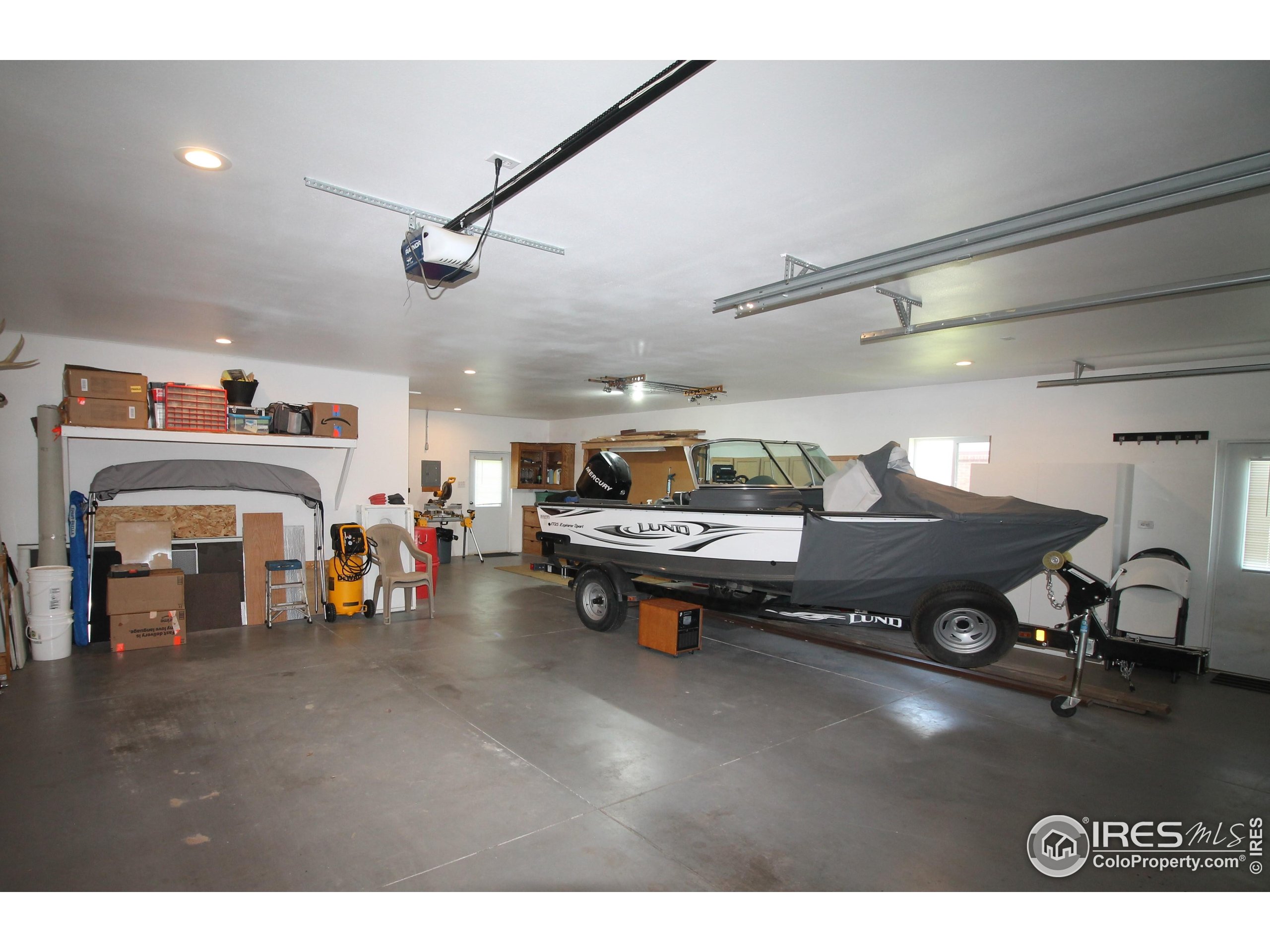14363 Dakota Road Sterling, CO 80751 - Photo 31 of 40 a living room with furniture and a flat screen tv