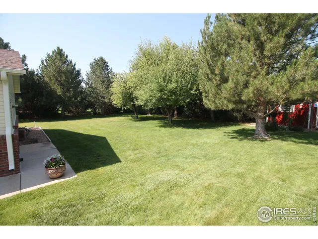 a aerial view of a house with a garden
