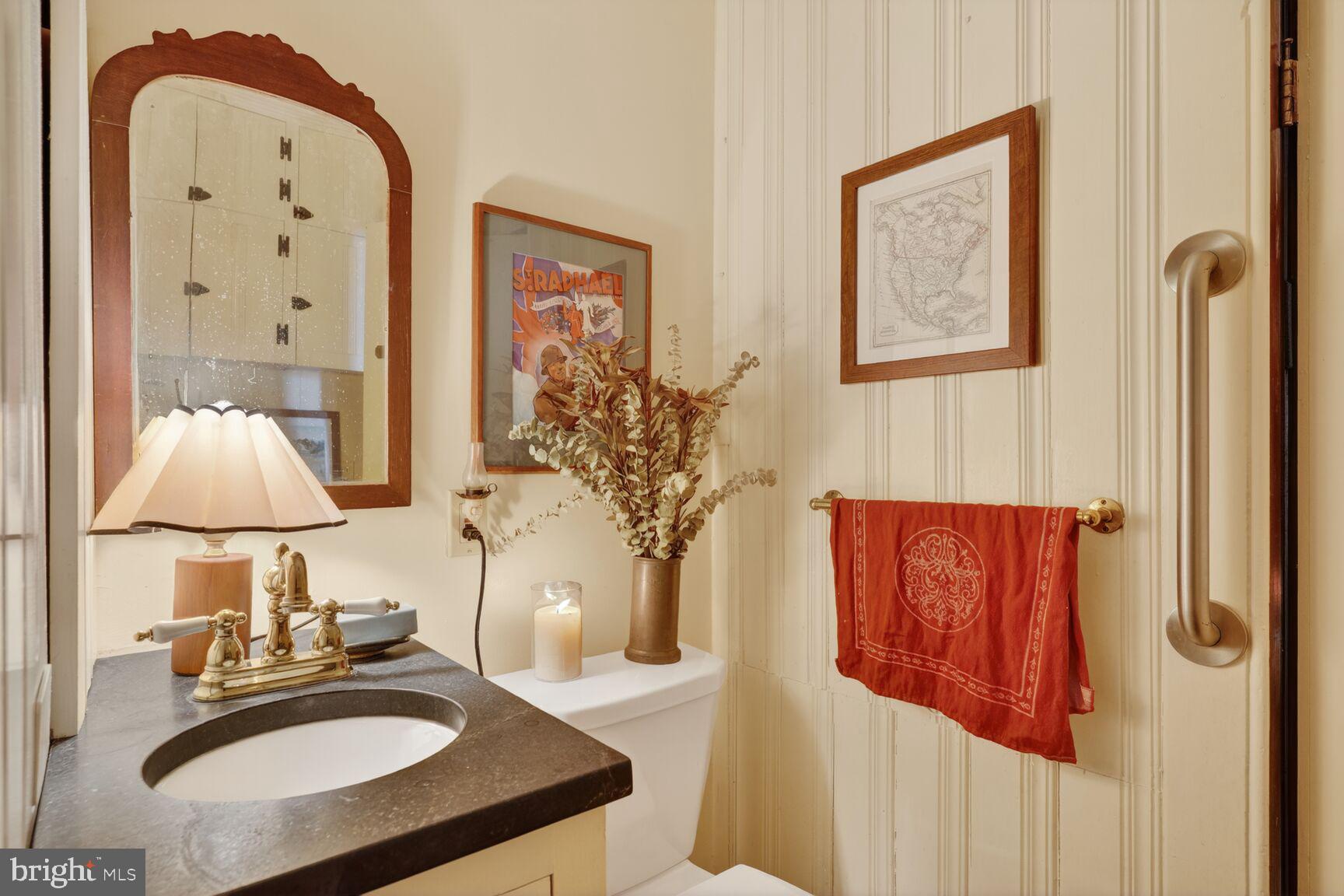 1222 28th Street Northwest Washington, DC 20007 - Photo 8 of 27 Main floor half bathroom