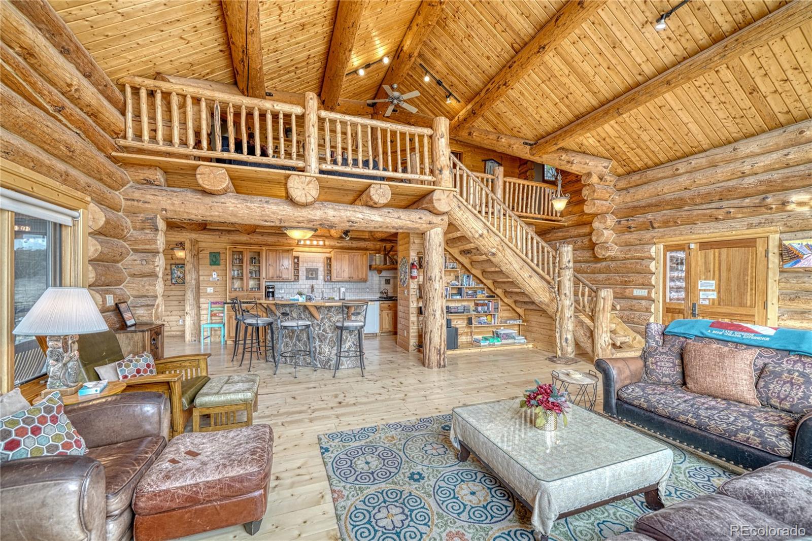 12098 County Road Salida, CO 81201 - Photo 16 of 49 a living room with furniture and a table