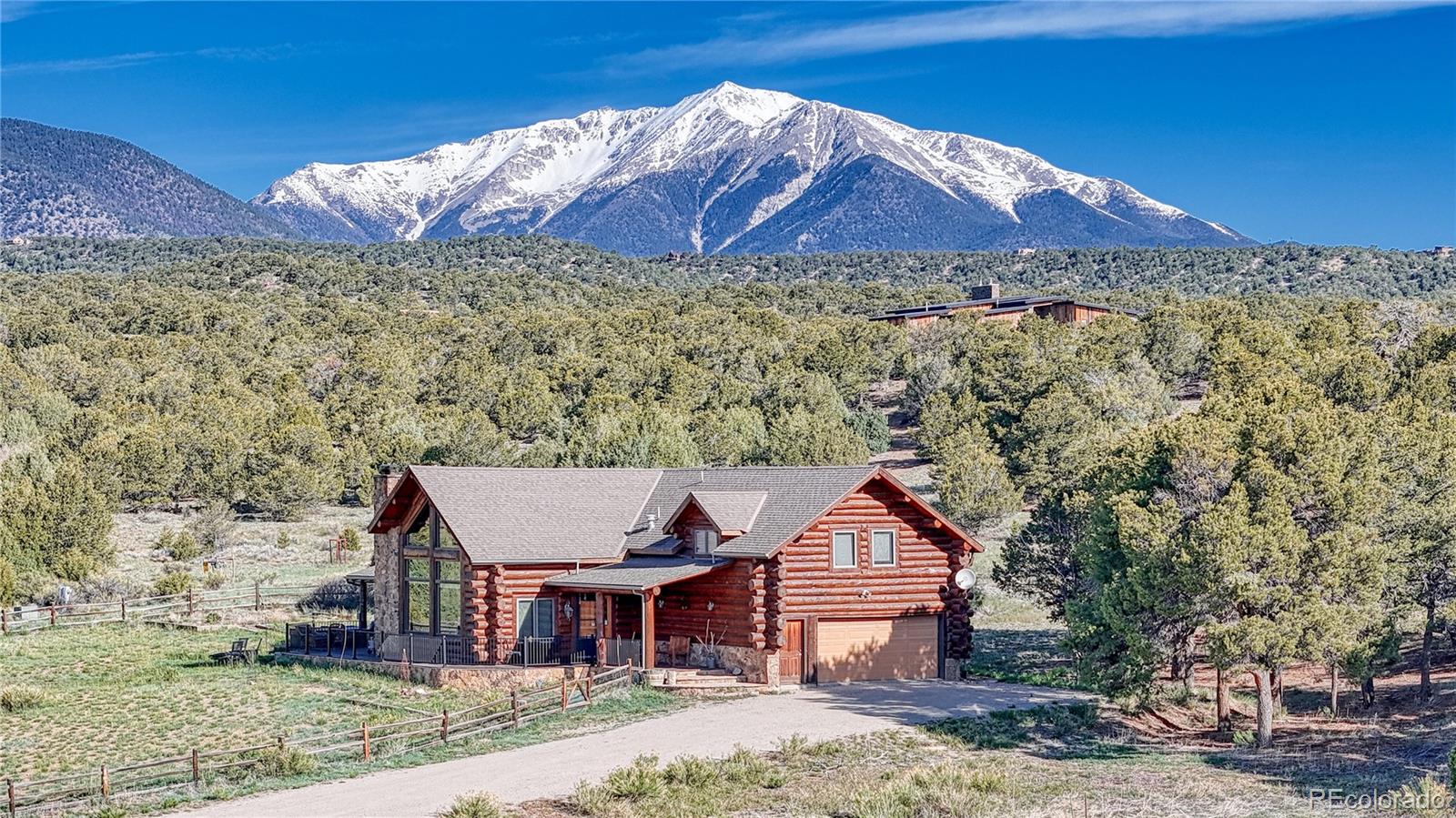 12098 County Road Salida, CO 81201 - Photo 2 of 49 a view of a house with a yard