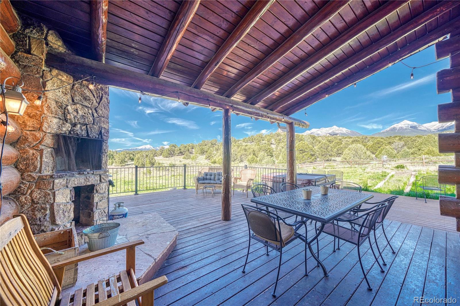 12098 County Road Salida, CO 81201 - Photo 32 of 49 a view of a patio with a table and chairs