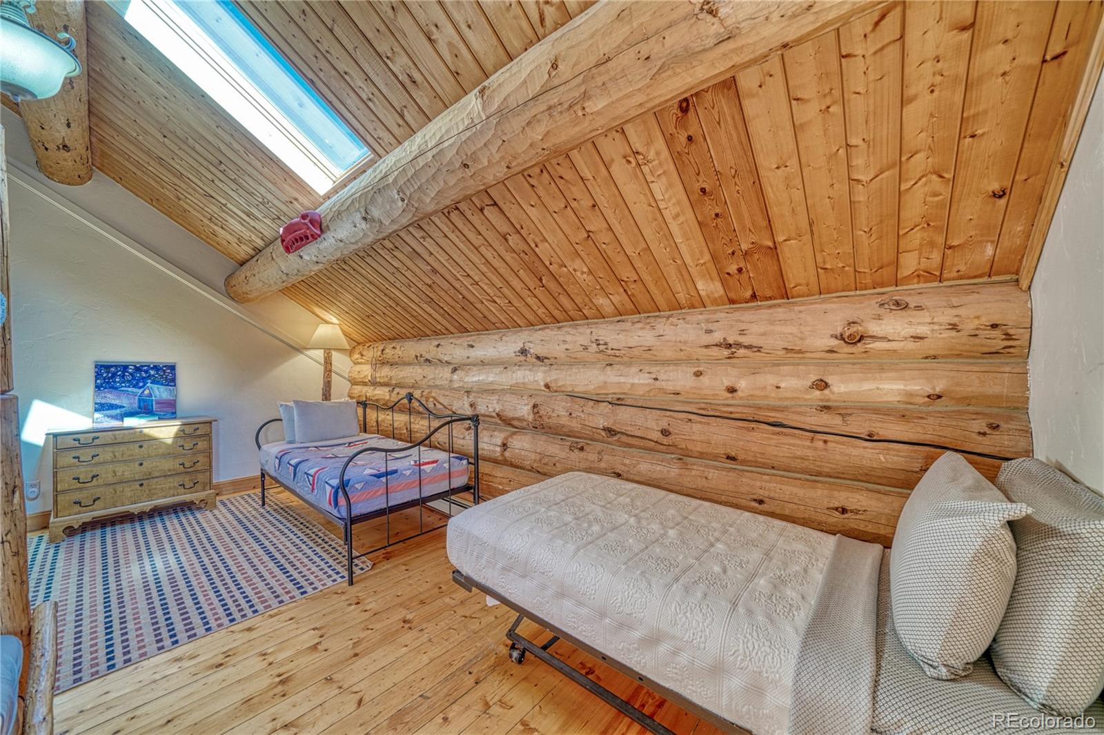 12098 County Road Salida, CO 81201 - Photo 36 of 49 a view of a room with wooden floor and furniture