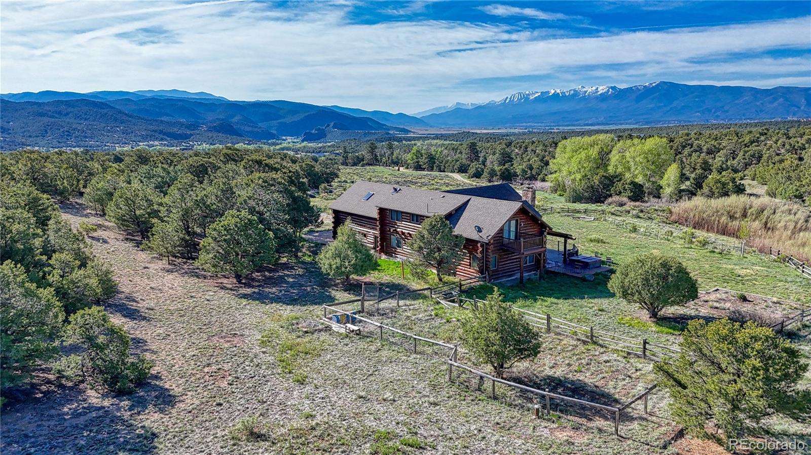 12098 County Road Salida, CO 81201 - Photo 9 of 49 a view of a house with a yard