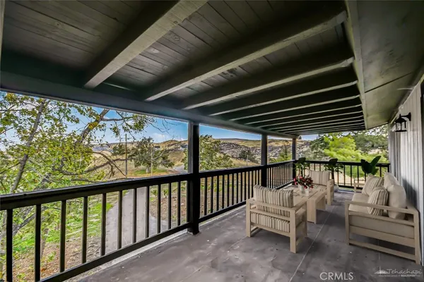a view of porch with seating space