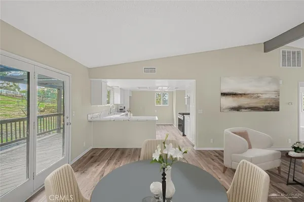 a room with furniture and a large window