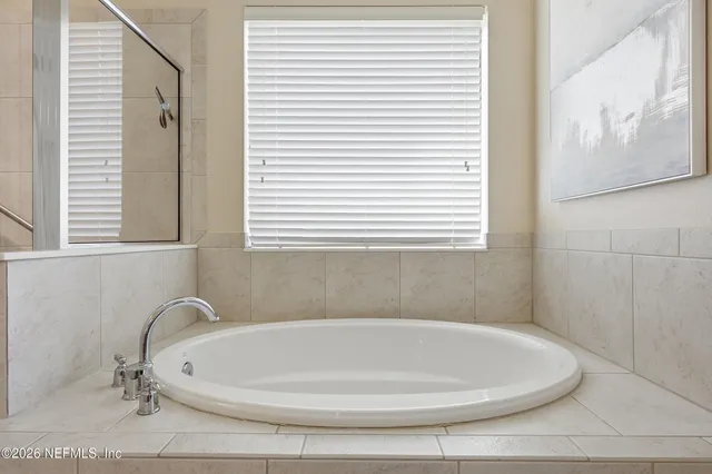 a view of a livingroom with furniture and a table