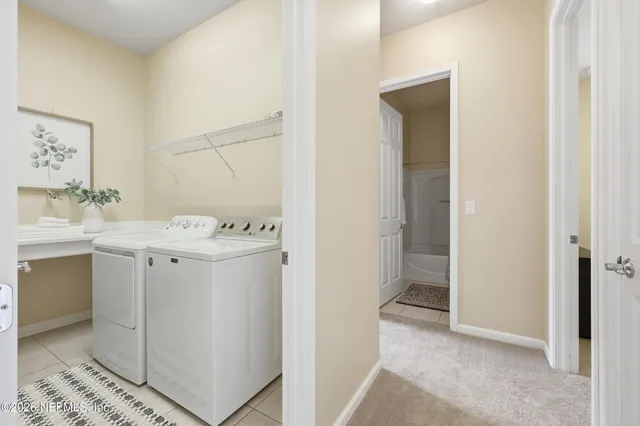 a bedroom with bed and window