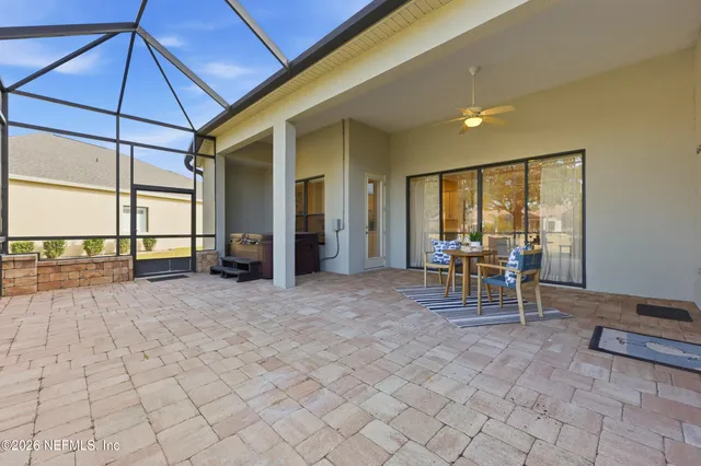 a view of a lake with houses in the background