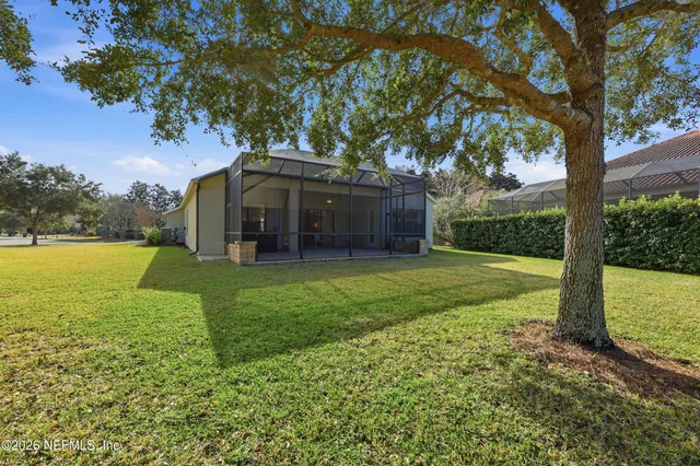 a view of a dining room with furniture wooden floor and a rug