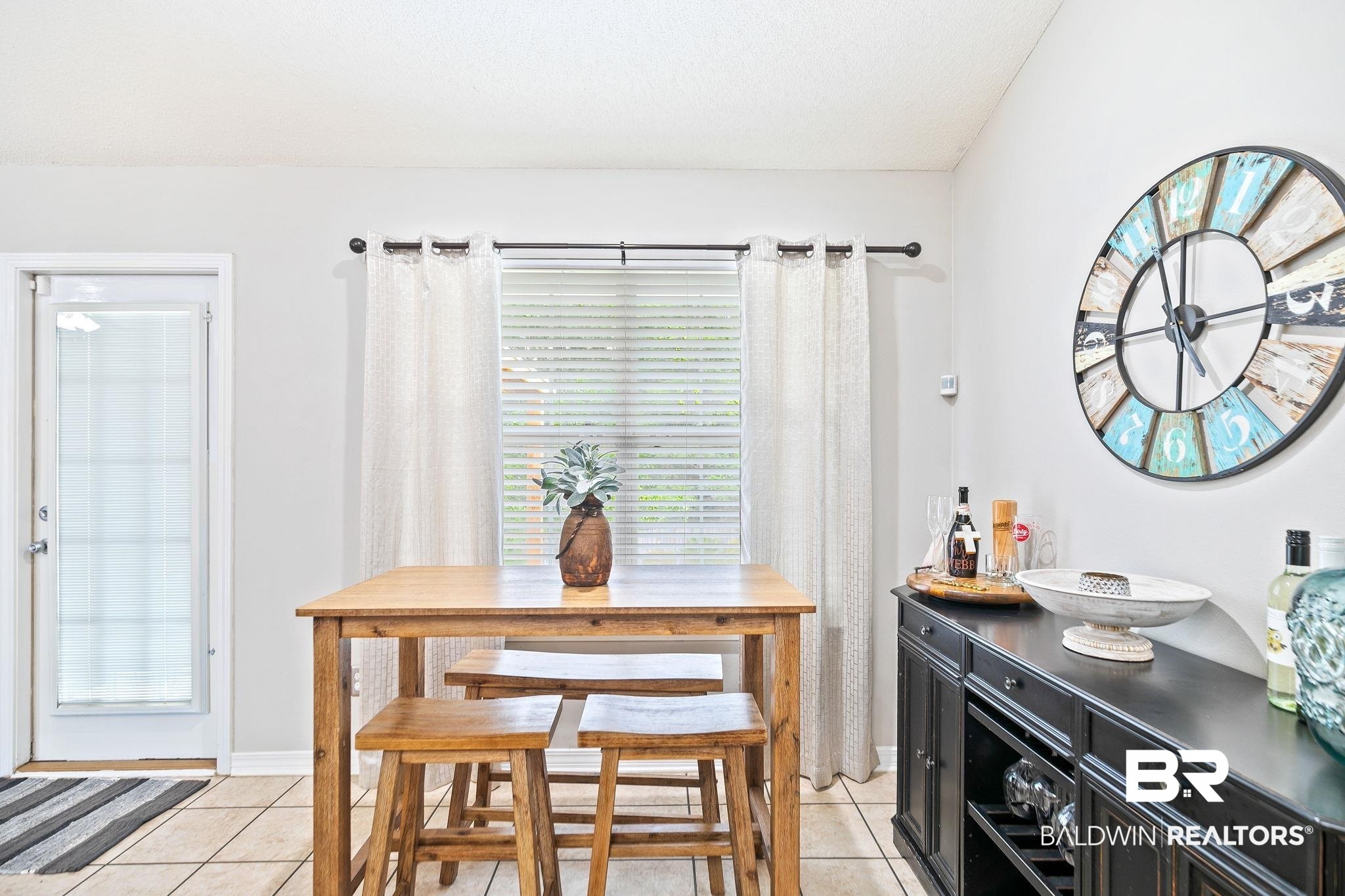 28246 Turkey Branch Drive Daphne, AL 36526 - Photo 15 of 41 Dining space with light tile patterned flooring