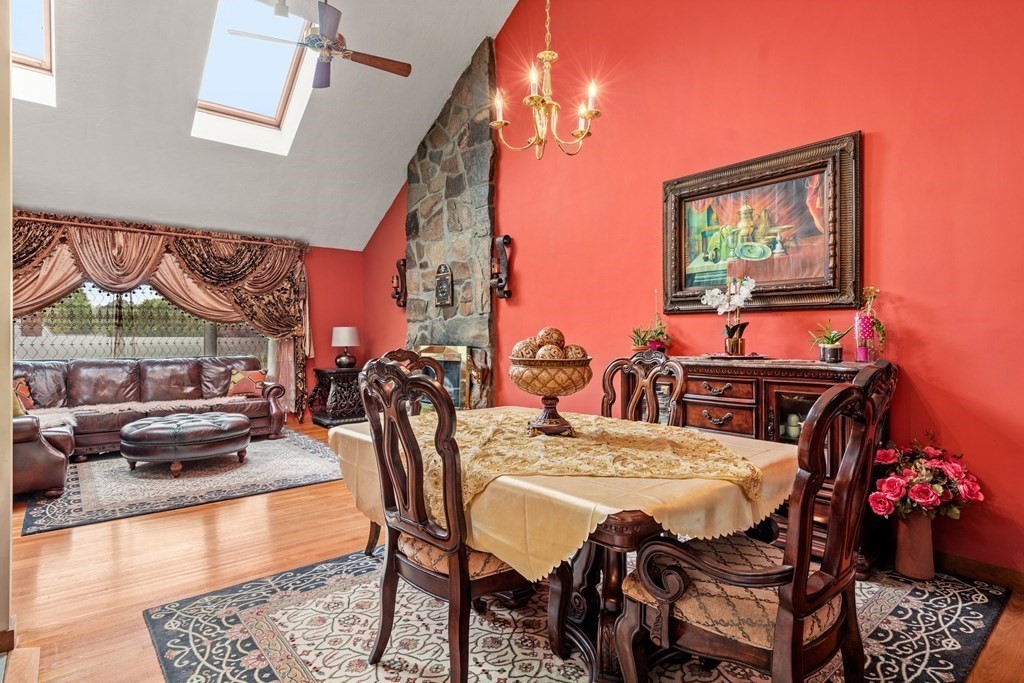 3 Macone Circle Stoneham, MA 02180 - Photo 14 of 26 a dining room with furniture and wooden floor