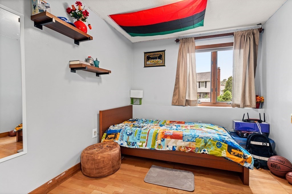 3 Macone Circle Stoneham, MA 02180 - Photo 20 of 26 a bedroom with a bed and window